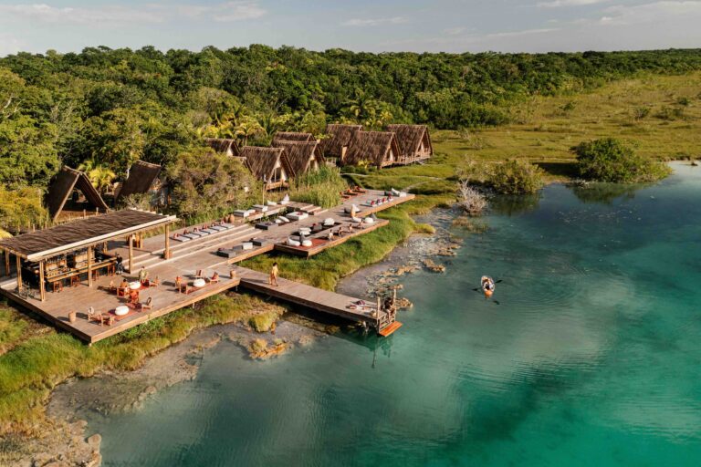 an aerial shot of our habitas bacalar with guests experiencing the property